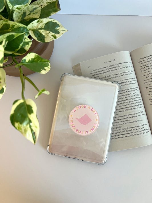 A Book a Day keeps Reality Away Kindle Grip