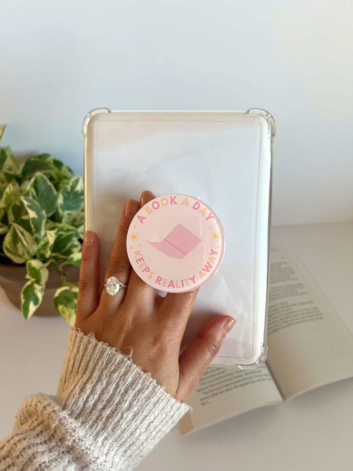 A Book a Day keeps Reality Away Kindle Grip